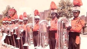 This is a shot of the horn section of The Riversiders Jr. Drum and Bugle Corps of Brooklyn NY, circa 1966-67. I was known as "Garfield" and played baritone bugle. I am fifth from the right. 